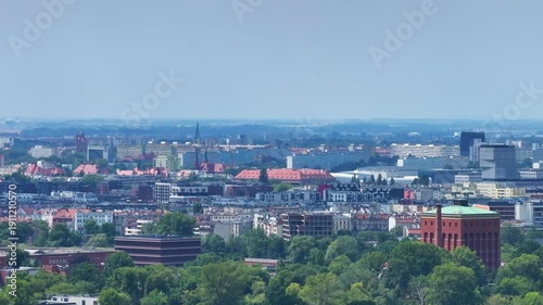 Metropolitan Skyline Panorama Wide panoramic sweep capturing the city's transition from historic spires to the Sky Tower