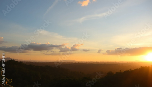 Golden evening horizon over jungle valley