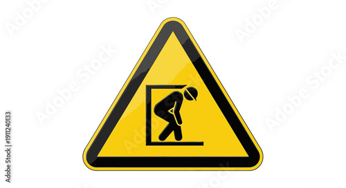 Yellow triangle hazard sign with a high voltage symbol warns of danger and electricity ahead for safety near a construction street or pedestrian crossing