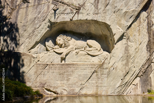 Historic lion monument in Lucerne, Switzerland, commemorating Swiss guards' bravery and sacrifice