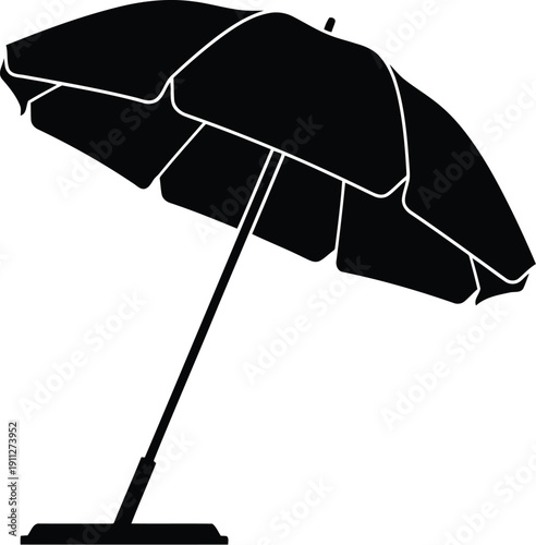 Silhouette of a beach umbrella providing shade on a sunny day
