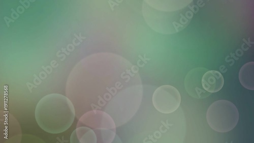 Soft green abstract background with glowing bokeh circles