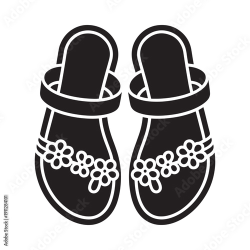 A pair of black and white illustrated sandals with floral details