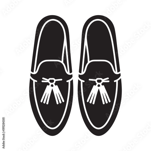 Black and white icon depicting a pair of classic loafers with tassels