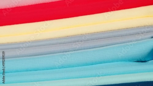 Wallpaper Mural A Stack of Folded Fabric Samples in Assorted Pastel Colors, Close Up Torontodigital.ca