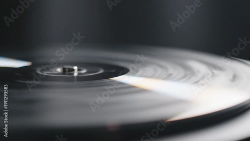 Spinning compact disc. Vintage cd player. Portable CD Player Retro Style. Close-up of rotating cd. 90s Nostalgia Music Device. Classic Audio Technology Gadget. Black shiny disc. Blur