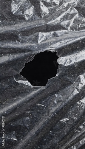 Torn plastic film texture background with crumpled transparent wrinkles and grunge overlay, abstract distressed surface for modern design and copy space