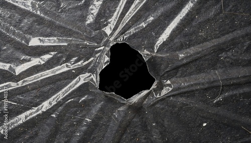 Torn plastic film texture background with crumpled transparent wrinkles and grunge overlay, abstract distressed surface for modern design and copy space