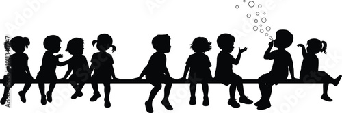 Group of Happy Children Sitting on a Bench Silhouette with a Boy Blowing Bubbles for Preschool School and Childhood Concept