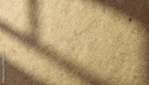 Natural kraft paper texture background with soft window shadow and warm beige tone, minimalist organic backdrop with copy space for eco branding and product mockups