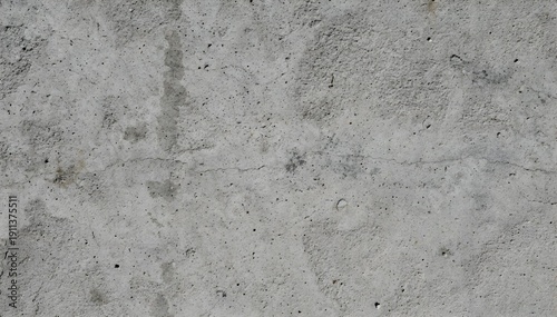 Neutral concrete wall texture background with subtle grain and soft light, minimalist industrial cement surface backdrop with copy space for business, construction and modern design
