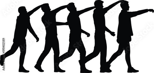 Silhouette of a line of young men walking blindly following a leader with hands on heads concept of teamwork guidance following or group conformity