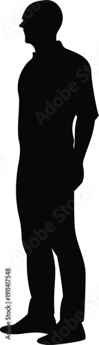 A stark silhouette of a man standing with hands casually tucked into pockets