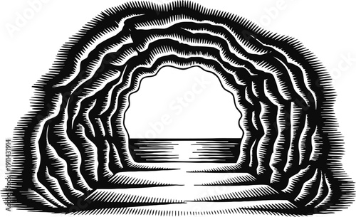 sunset viewed from inside rocky sea cave opening over calm ocean horizon