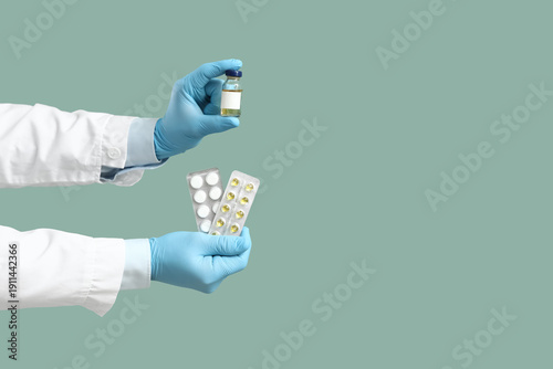 Hands of doctor with pills ...