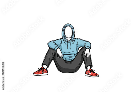 Man in blue hoodie and dark pants sitting on the floor.
