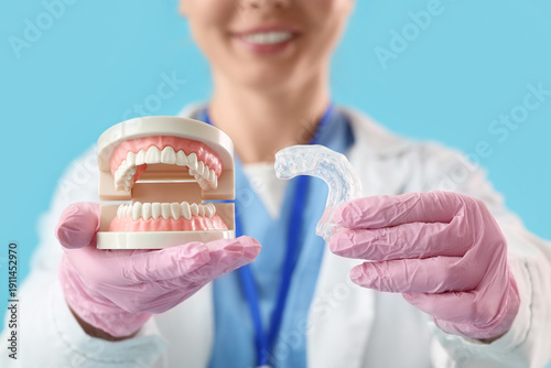 Female dentist with occlusa...