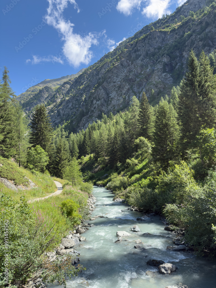 Obraz premium Mountain landscape on a hiking trail formed by Rutor glacier, La Thuile, Aosta Valley, Italy