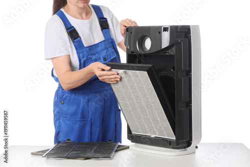 Female technician changing ...