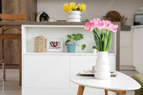 Vase with tulips and magazi...