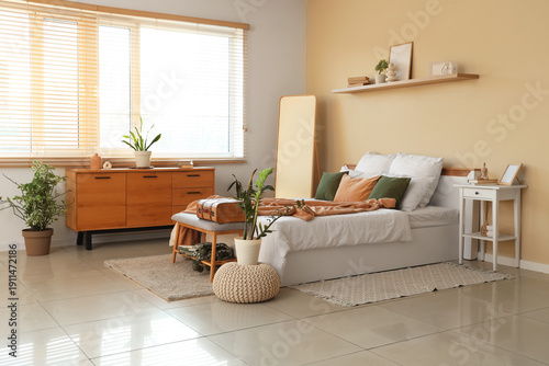 Interior of cozy bedroom wi...