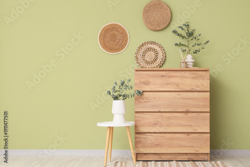 Vases with eucalyptus branc...