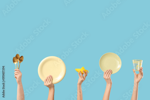 Female hands with plates, g...