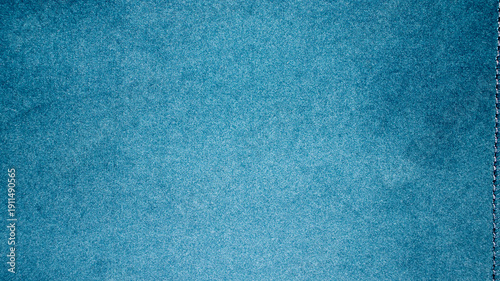 Fotografía A high-quality close-up of a vibrant blue fabric texture with a soft, matte finish and subtle grain