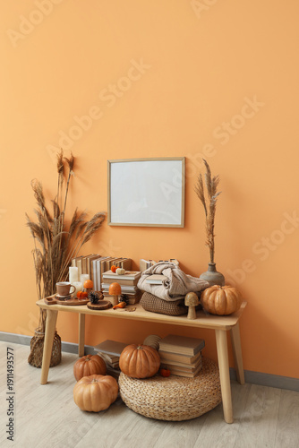 Wooden table with autumn de...