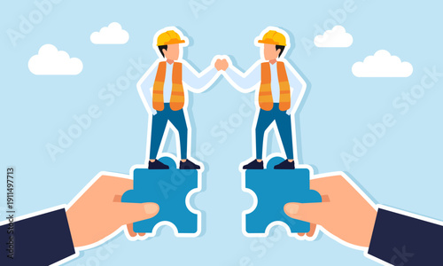Two engineers shaking hands on puzzle piece held by hand illustration of agreement collaboration and teamwork in completing project