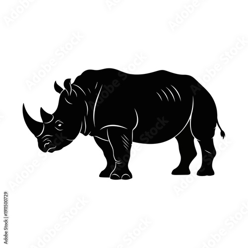 A striking black silhouette of a rhinoceros standing in profile