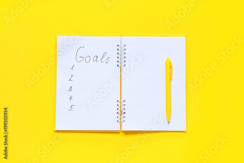 Notebook with list of goals...