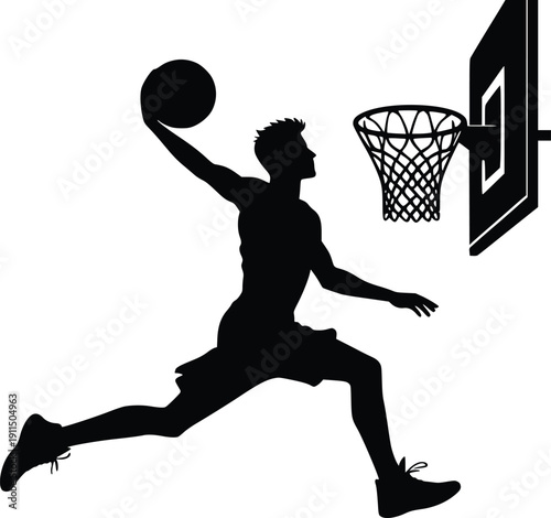 Silhouette of a basketball player making a layup near the hoop
