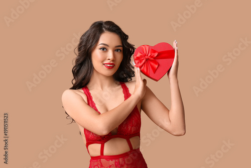 Beautiful young happy Asian...