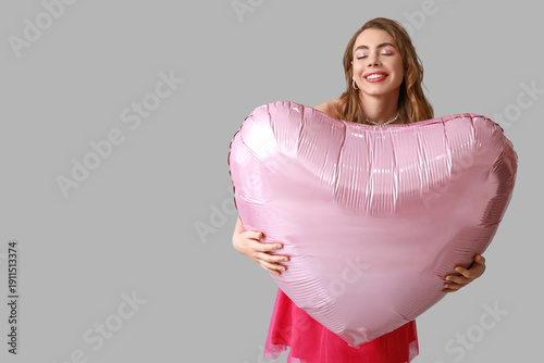 Young woman with big heart-...