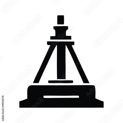 Black silhouette of a surveying instrument on a tripod, a fundamental tool for topographical measurements and construction site layouts