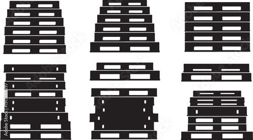 Collection of black wooden pallets in various stack configurations