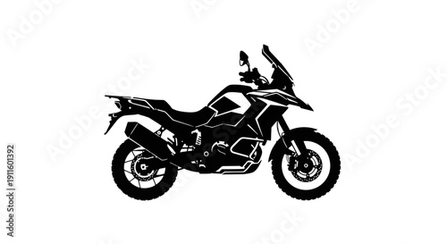 Modern adventure touring motorcycle silhouette with windshield and rugged tires