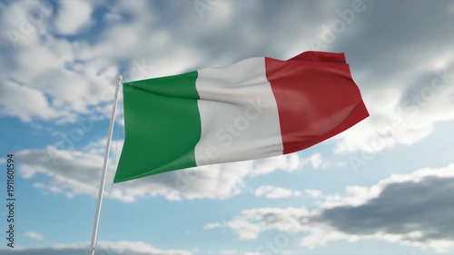 Italian flag waving in the wind against a cloudy sky