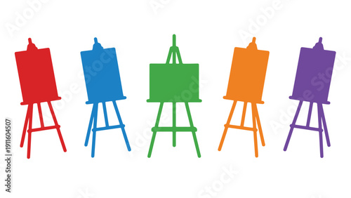 Easel stands with colorful blank canvases for artistic creation
