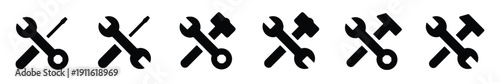 Collection of tool icons featuring crossed wrenches and hammers for repair and construction