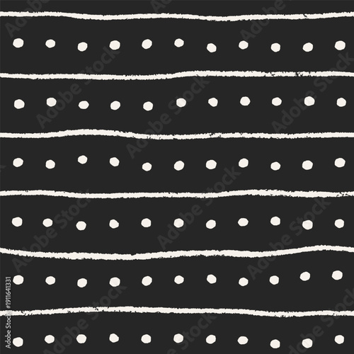 Seamless abstract pattern. Black and white background with hand-drawn dots, s...