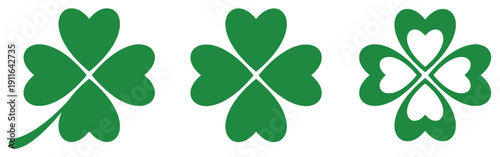 Green four-leaf clover icons symbolizing luck and nature
