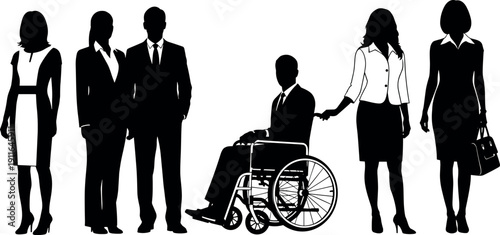 Diverse professional business team including corporate executives and a businessman in a wheelchair standing together for office workplace inclusion and equality.