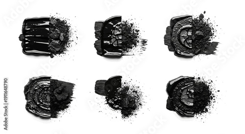 black liquid paint and charcoal powder create abstract textured swatches and explosive patterns isolated on white.