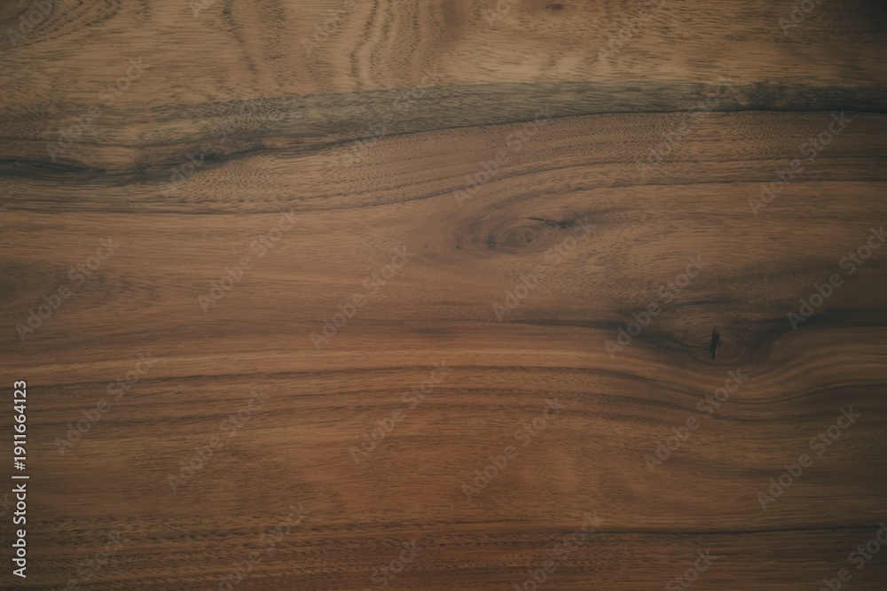 Obraz premium Natural wooden surface with rich brown grain texture, horizontal wood background and warm organic material pattern