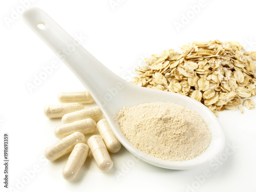 Foto Food and Health - Beta Glucan with Capsules isolated on white Background - Healt