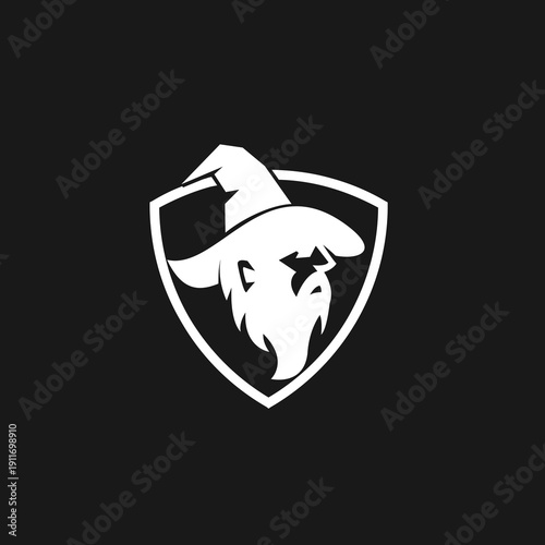 Stylized Wizard Head in Shield Emblem Logo Vector Graphic
