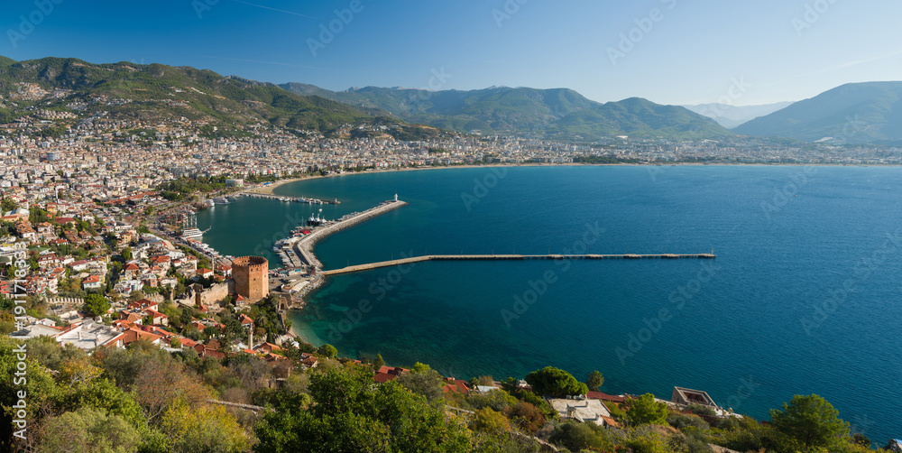 Fototapeta premium Antalya, Turkey - View of the Red Tower and Alanya harbour from the walls of Alanya castle.