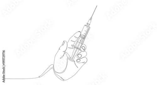 Hand holding a medical syringe with needle.